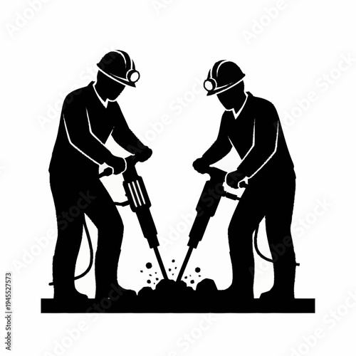 Two construction workers operating jackhammers breaking ground.