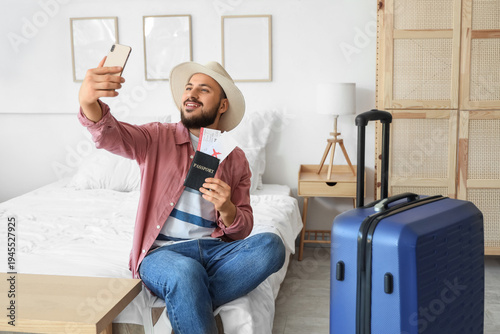 Male tourist with passport ...