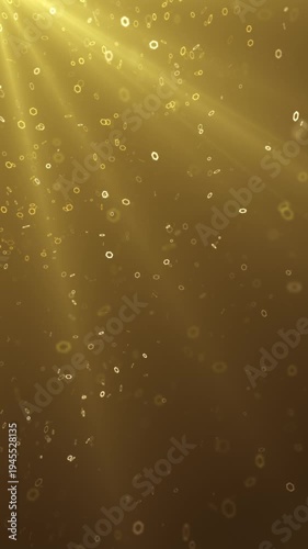 Hexagon Gold Particles Loop. Background with hexagon shape elements floating and lighted by ray beam. 10 seconds clip, seamless loop 2160×3840 resolution, vertical.
