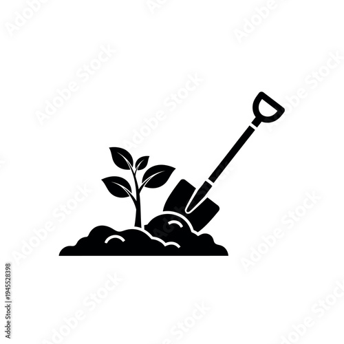 Planting a new tree sapling with a shovel.