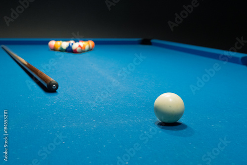 pool balls on a blue background