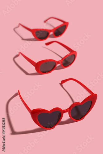 Different red sunglasses on...