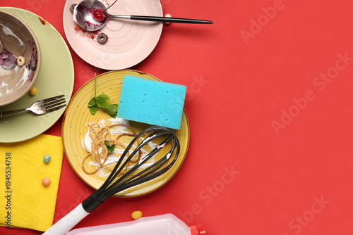 Many dirty dishes with spon...
