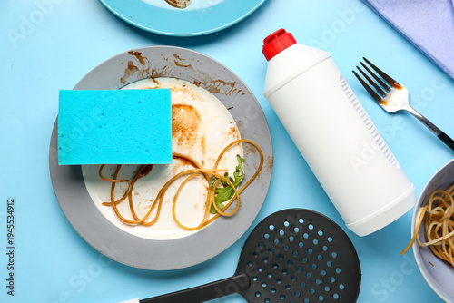 Dirty dishes with cutlery, ...