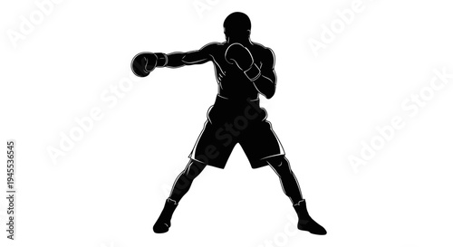 Silhouette of a Boxer Throwing a Punch in Boxing Ring.