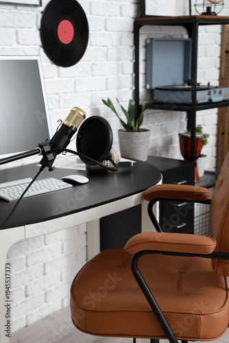 Workplace with microphone in recording studio