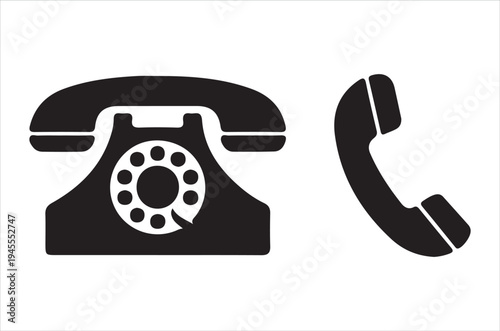 Black silhouette of a vintage rotary phone with a detached handset