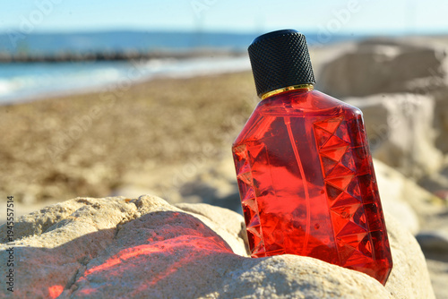 Bottle of elite perfume on ...