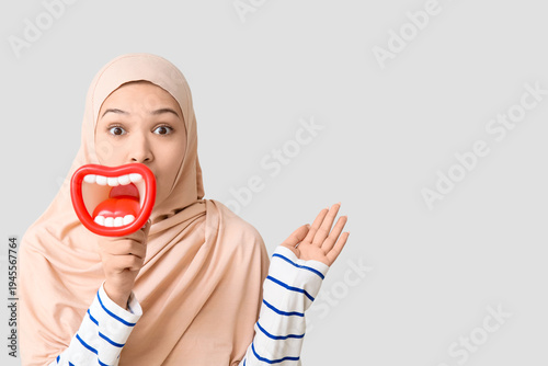 Shocked young Asian Muslim ...