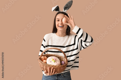 Pretty young woman with bun...