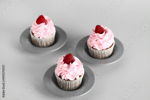 Plates with tasty raspberry...