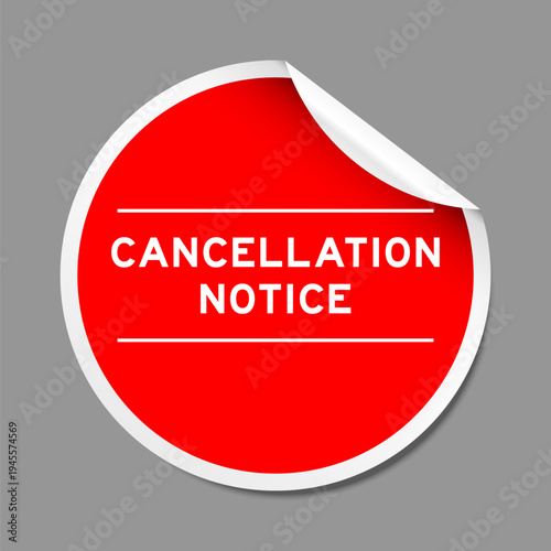 Red color peel sticker label with word cancellation notice on gray background