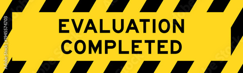 Yellow and black color with line striped label banner with word evaluation completed