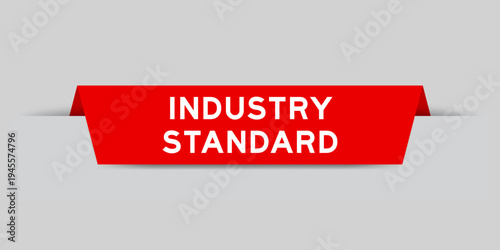 Red color inserted label with word industry standard on gray background