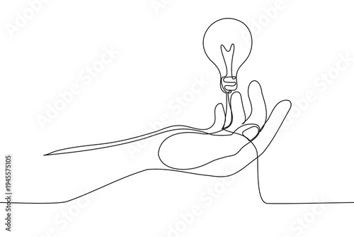 human hand holding a glowing light bulb, representing a new idea, creativity, innovation