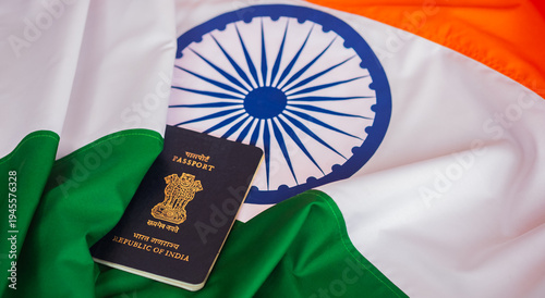 Cuadro en lienzo Blue Indian passport on national flag background close up