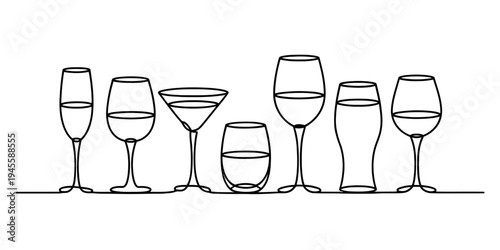 Various wine and cocktail glasses on a table, empty and clean, ready for use