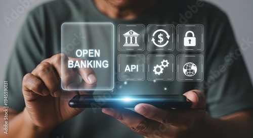 A person using a smartphone with holographic icons representing open banking concepts