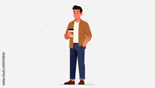 Young man stands casually holding a coffee cup. He wears a beige jacket, blue jeans, and brown shoes. His smile suggests relaxed, friendly demeanor. Simple background highlights his presence clearly