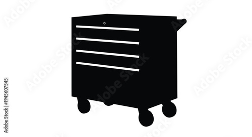 Black toolbox with drawers shown in stark silhouette