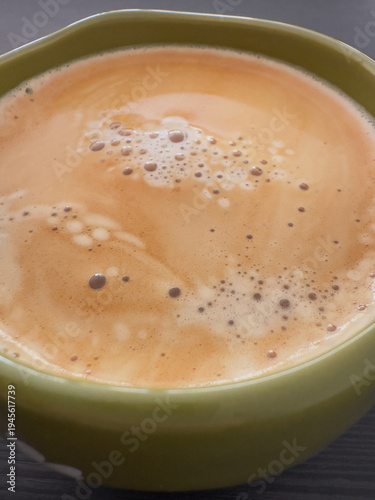 Obraz na plátne Macro view of espresso crema and bubbles on freshly brewed coffee surface