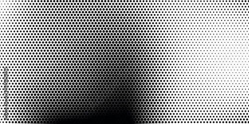 Hexagon halftone gradient texture. Abstract black grunge background. Geometric retro halftone tech overlay. Fading wavy hexagonal pattern backdrop. Vector vanishing honeycomb grunge bitmap wallpaper