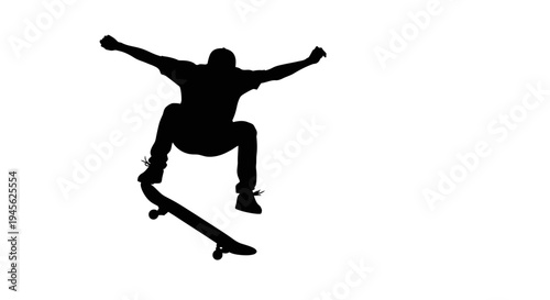 Silhouette of Skateboarder Performing Jump Trick in Mid-Air.