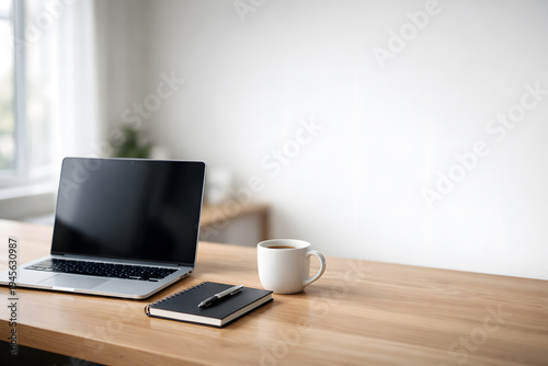 Modern Minimal Workspace with Laptop Coffee and Notebook on Wooden Desk