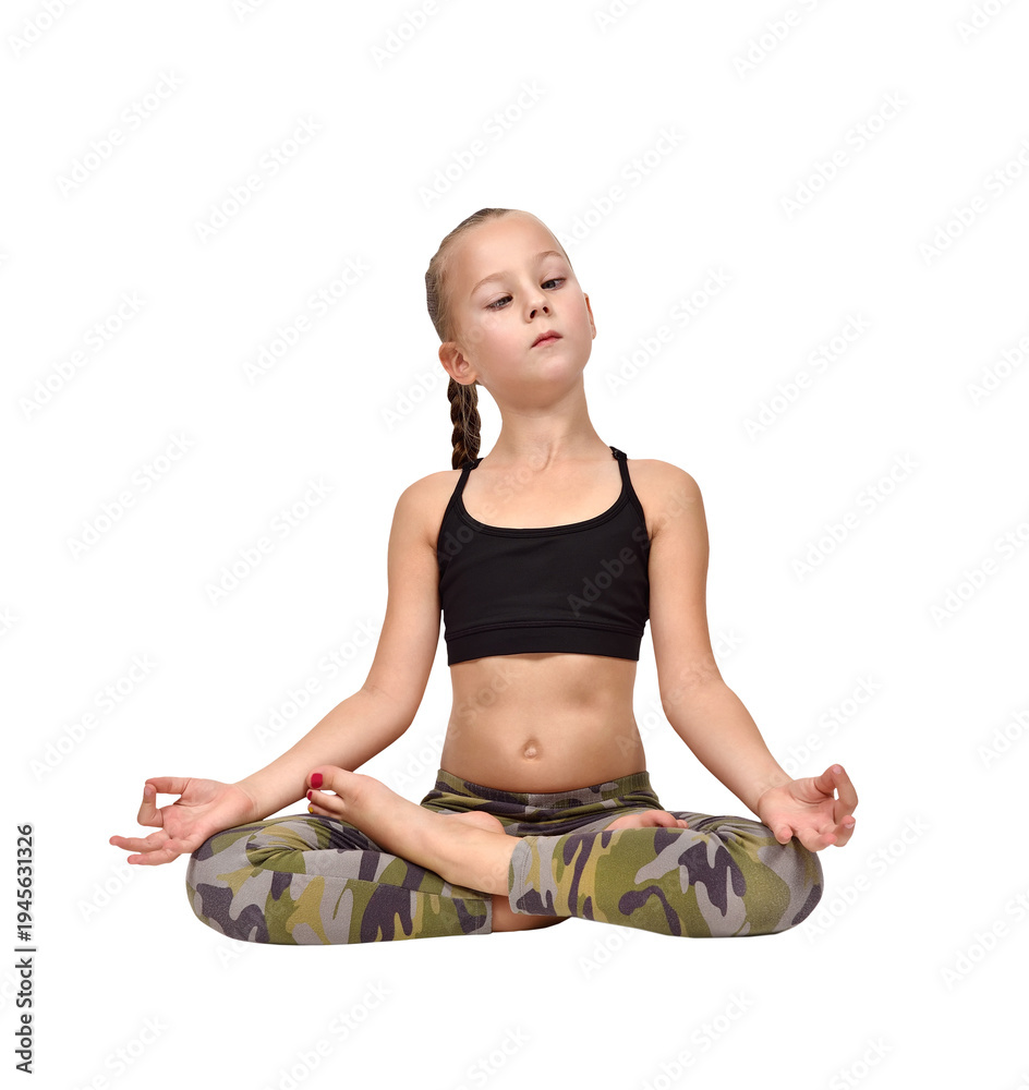 Naklejka premium Little girl in camouflage leggings sitting in lotus yoga pose