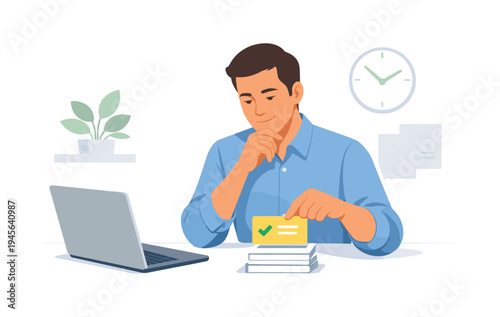 Man in blue shirt contemplating a yellow card with a green checkmark and stack of books. A thoughtful man sits at a desk with a laptop, holding a card with a checkmark over a stack
