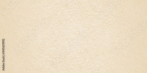 Beige textured paper background with subtle grain, minimalist cream stucco wall surface for luxury brand backdrop