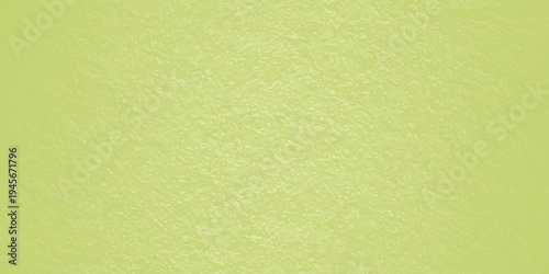 Green textured wall background with subtle grainy plaster surface, lime green abstract backdrop for copy space