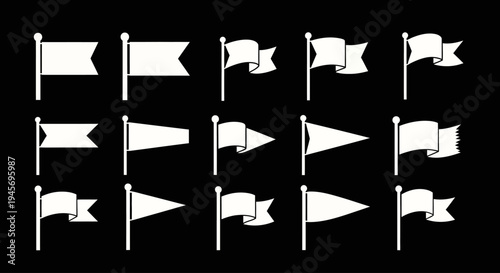 Assortment of white blank flag shapes waves from poles against a dark background for design.