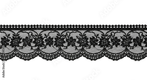 A black lace trim on a white background