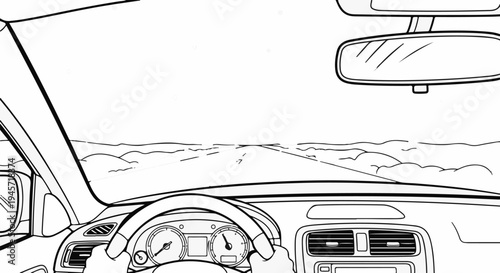 View from inside a car, hands on wheel, driving on road through landscape
