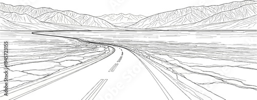 Winding road through a barren landscape towards distant mountains under a vast sky