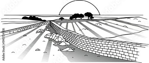 Sun setting over a rural landscape with a stone wall and fields