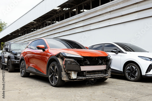 Damaged Car Front After Accident Parked for Repair Automotive Insurance and Collision Damage Concept