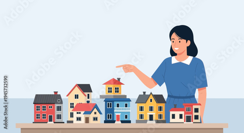 Smiling Woman Choosing from Various House Models on a Tabletop Display