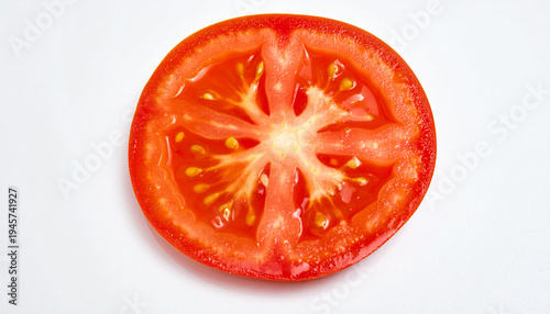 Wallpaper Mural Fresh red tomato slice isolated on a clean white background with visible seeds and pulp Torontodigital.ca