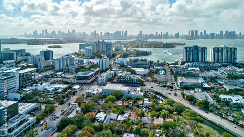 Drone aerial view of urban coastline and city skyline Miami Beach