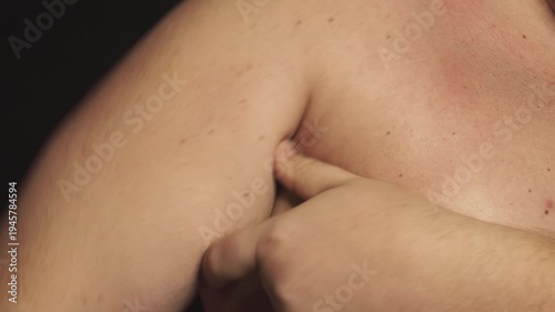 Wallpaper Mural A man shows off his folds of fat Torontodigital.ca