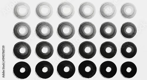 Abstract monochrome artwork featuring circles arranged in a patterned composition on a backdrop
