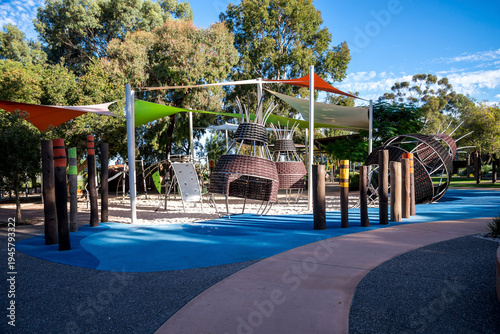 Indigenous-themed playground with woven baskets and shade sails at Bibra Lake park, 1 April 2021, Perth, Australia