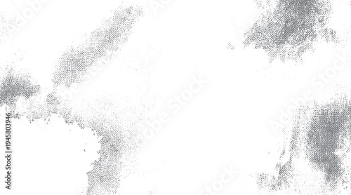 Grey textured dots forming abstract shapes on white background