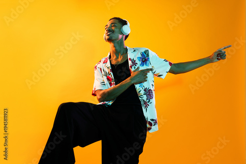 Fotografie Cool african young man portrait in studio on colorful background - Stylish black