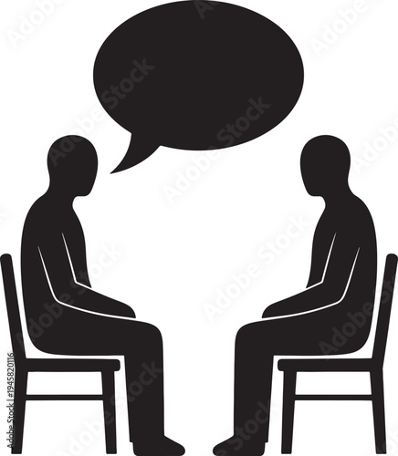 Two people sitting in chairs having a conversation