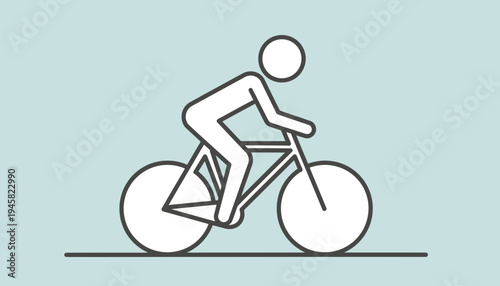 Cyclist rides bicycle in outdoor setting