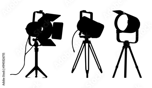 Spotlights set with solid black silhouette of a vintage theatrical spotlight on a stand featuring film noir, precise edges, white background with black silhouette and spotlight