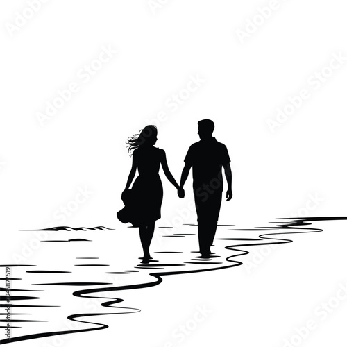 Silhouetted couple walking hand in hand along a beach at sunset